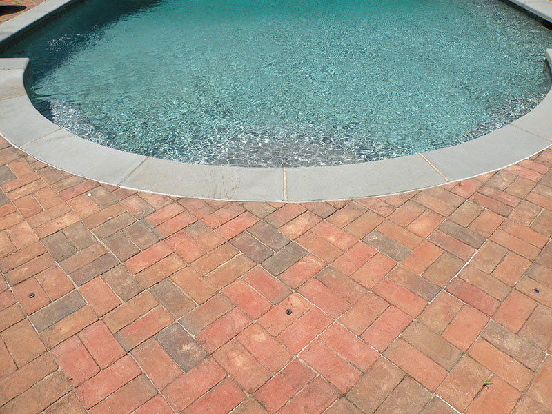 stone patio around pool