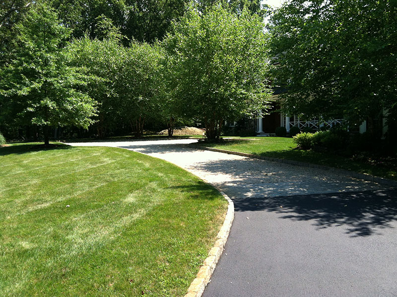 paved driveway pebblestone driveway
