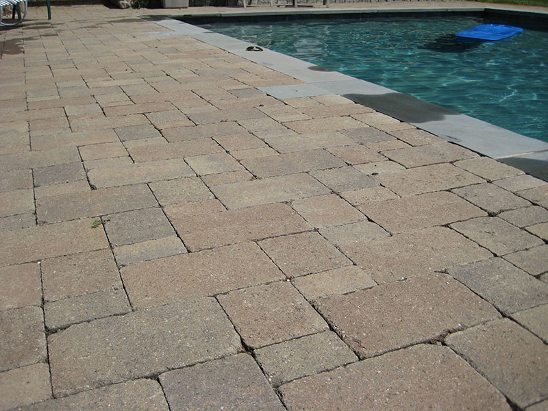 stone patio around pool