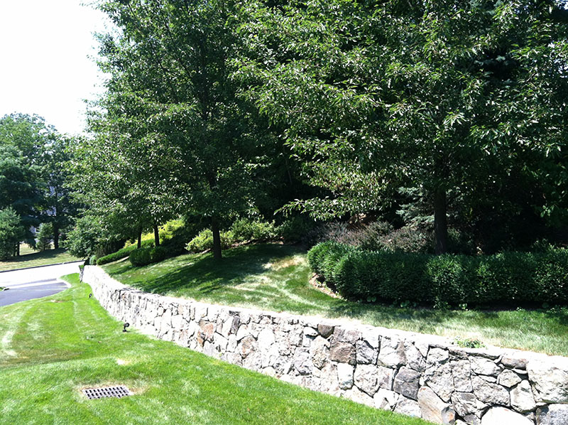 long stone wall along driveway